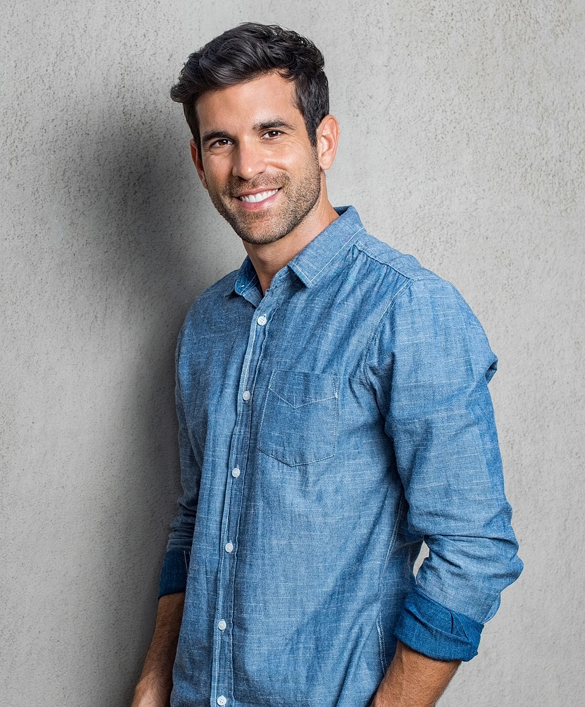 Gainesville, FL male tummy tuck model in demin shirt