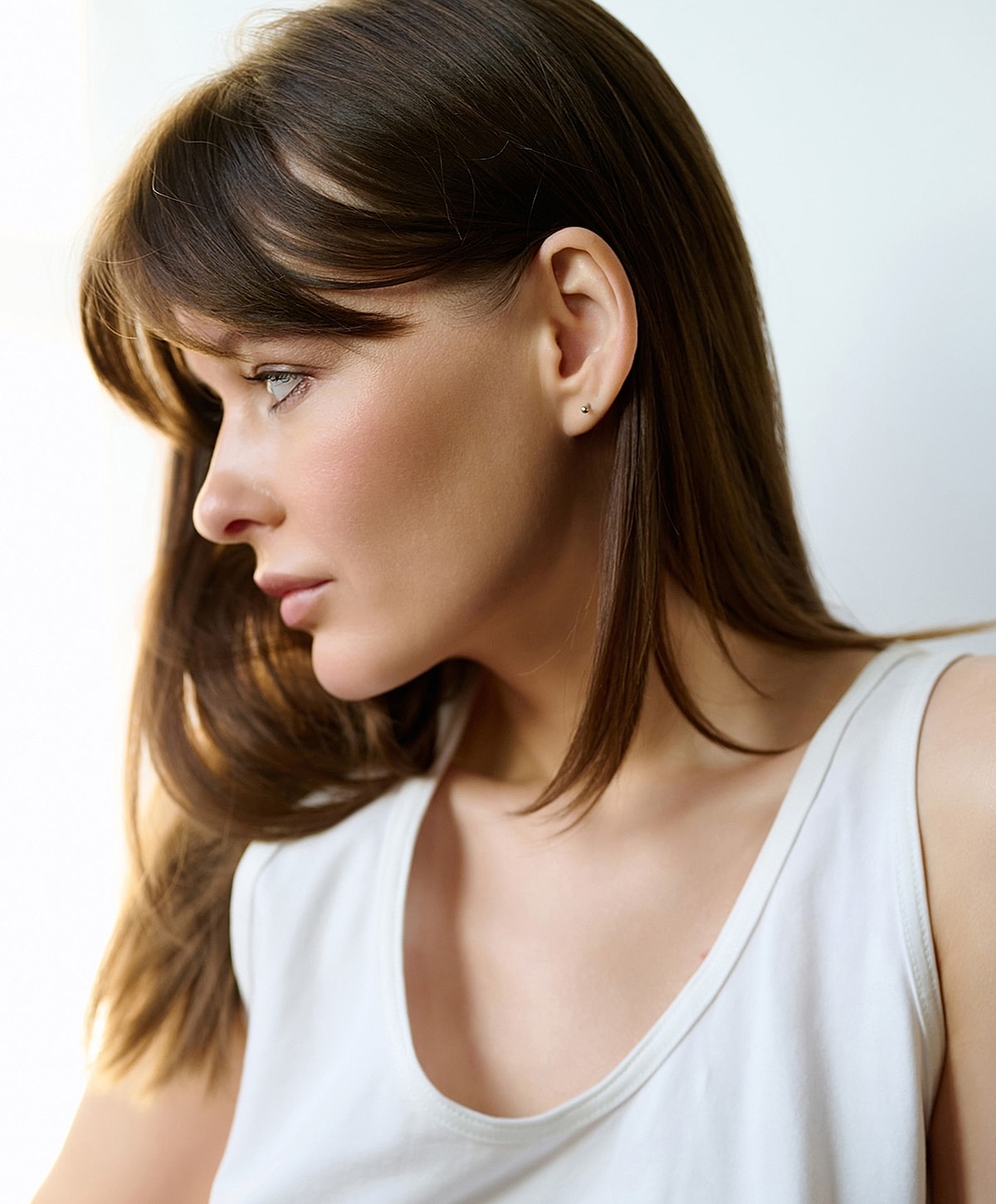 Gainesville, FL RHA model with light brown hair in profile.