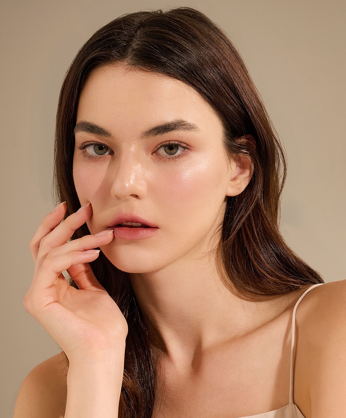 Model with natural makeup and soft lighting