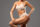 Woman modeling a tan underwear set